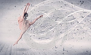 Performance ballet dancer jumping with energy explosion particles