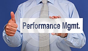 Performance Management - Businessman with sign