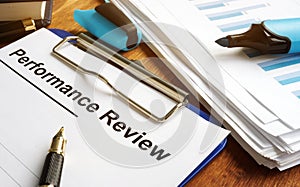 Performance review form with clipboard