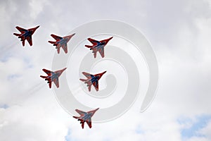 Performance of the Swifts aerobatic team on multi-purpose highly maneuverable MiG-29 fighters over the Myachkovo airfield photo