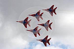 Performance of the Swifts aerobatic team on multi-purpose highly maneuverable MiG-29 fighters over the Myachkovo airfield photo