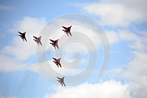 Performance of the Swifts aerobatic team on multi-purpose highly maneuverable MiG-29 fighters over the Myachkovo airfield photo