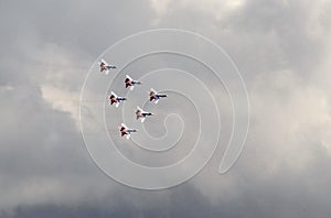 Performance of the Swifts aerobatic team on multi-purpose highly maneuverable MiG-29 fighters over the Myachkovo airfield photo