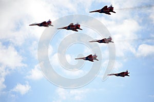Performance of the Swifts aerobatic team on multi-purpose highly maneuverable MiG-29 fighters over the Myachkovo airfield photo