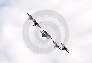 Performance of the Swifts aerobatic team on multi-purpose highly maneuverable MiG-29 fighters over the Myachkovo airfield photo