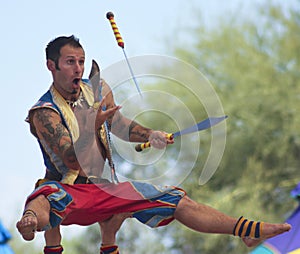 A Performer Juggles Knives at the Arizona Renaissance Festival