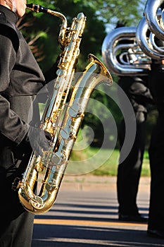 Performer Playing Baritone saxophone in Parade