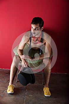 Performer seated backstage