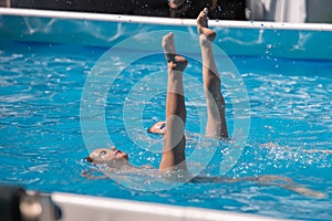 Performing Artistic Duet in Swimming Pool: Synchronized Swimming during Exercise