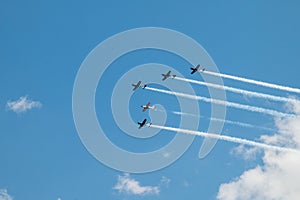 Performing Fighter Planes Flying in Formation