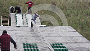 Performing stunts on a snowboard