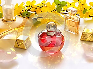 Perfume aroma in red spring mimosa collection yellow leaves on white background ,fragrance perfume bottle red  glass   with flower