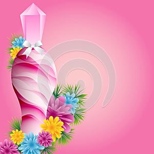 Perfume bottle and flowers
