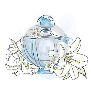 Perfume bottle and flowers. photo