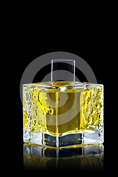 Perfume bottle isolated on black