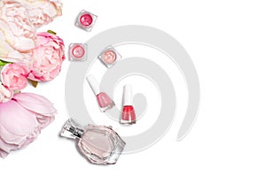 Perfume bottle, nail polish, lipstick. Fashion woman still life. Pop female things with flowers on white background.