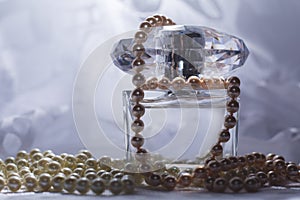 Perfume bottle with pearls
