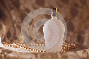 Perfume bottle with pearls