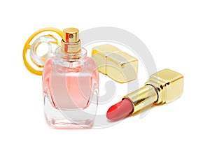 Perfume bottle and red lipstick