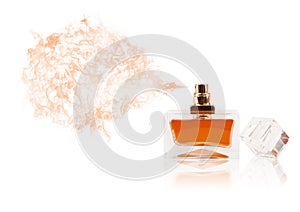 Perfume bottle spraying colored scent