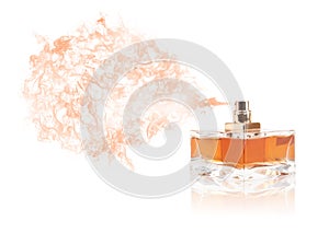 Perfume bottle spraying colored scent