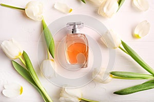 Perfume bottle with tulip flowers