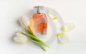 Perfume bottle with tulip flowers