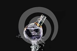 Perfume bottle on water