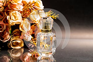 Perfume bottles and flowers have orange