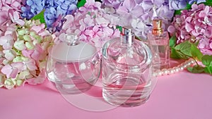 Perfume bottles and hydrangea flowers