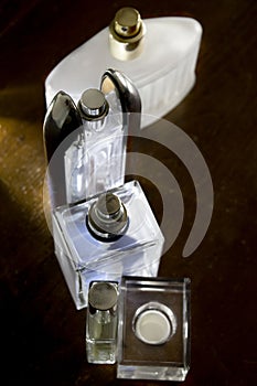 Perfume bottles illumined with high and low light