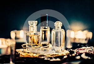 Perfume bottles and vintage fragrance at night, aroma scent, fragrant cosmetics and eau de toilette as luxury beauty brand,
