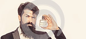 Perfume or cologne bottle and perfumery, cosmetics, scent cologne bottle, male holding cologne. Masculine perfume