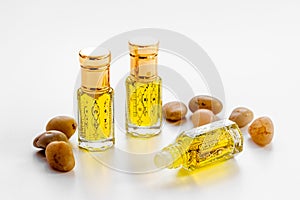 Perfume essential oil in glass bottles. Traditional Arabian incense