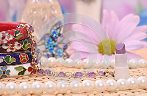Perfume and Jewelry With Flower and Jewelry Box close up