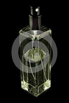 Perfume Spray bottle isolated on black background