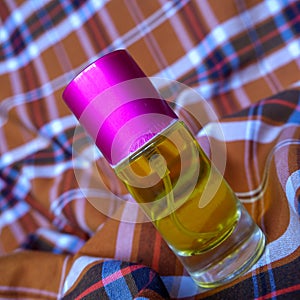 Perfume on a two-tone plaid background