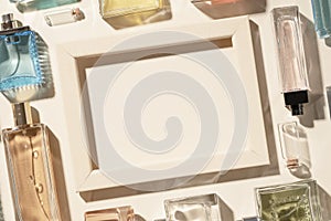 Perfumes and cosmetics, beige frame and blank background of copyspace for ads and advertisements. The beauty and fashion