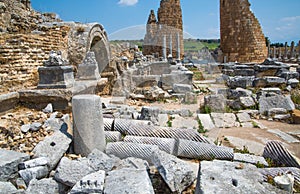Perge, Old Gate tower and ruins of market square. Greco-Roman ancient city Perga. Greek colony from 7th century BC,