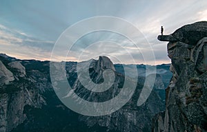 Perhaps the best view of glacier point where this unknown adventurer dares to stand on the edge