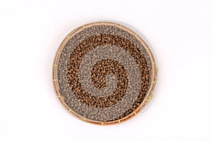 Perilla, dry seeds on a white background.