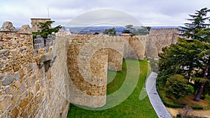 Perimeter wall of the medieval city of Avila together with annexed gardens.