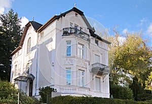 Period of promotion style house in residential area