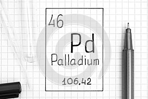 The Periodic table of elements. Handwriting chemical element Palladium Pd with black pen, test tube and pipette