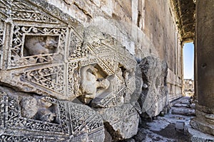 Peristyle of Temple of Bacchus with a carved stone block, Heliopolis Roman ruins, Baalbek, Lebanon