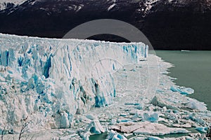 Perito Moreno glacier in Patagonia, Argentina. Melting ice due to climate change photo