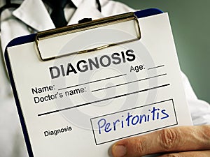 Peritonitis diagnosis. Doctor holds medical documents