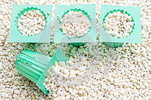 Perlite with green cup