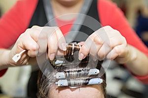 Perm in the beauty salon