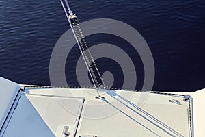Permanent backstay is attached to the top of the mast.